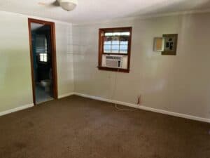 a bedroom in 1606 Oakwood Avenue, Raleigh, N.C., a 2-bedroom home listed for sale by Raleigh Homes Realty