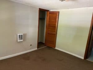 a bedroom in 1606 Oakwood Avenue, Raleigh, N.C., a 2-bedroom home listed for sale by Raleigh Homes Realty